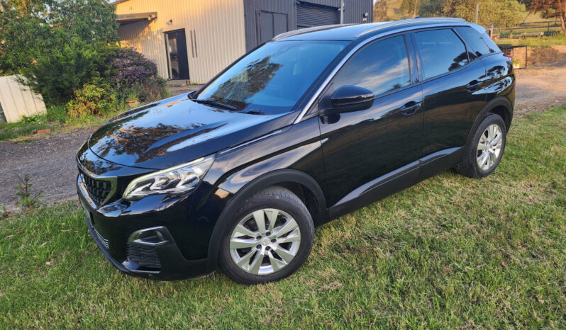 Black Peugeot 3008 — actual front three-quarter exterior photo