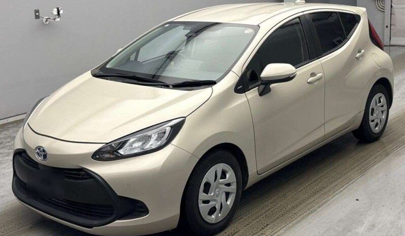 Toyota Aqua Hybrid – Gold – In Transit full
