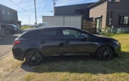 Toyota Corolla Touring Hybrid – Black – In Transit