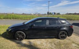 Toyota Corolla Touring Hybrid – Black – In Transit